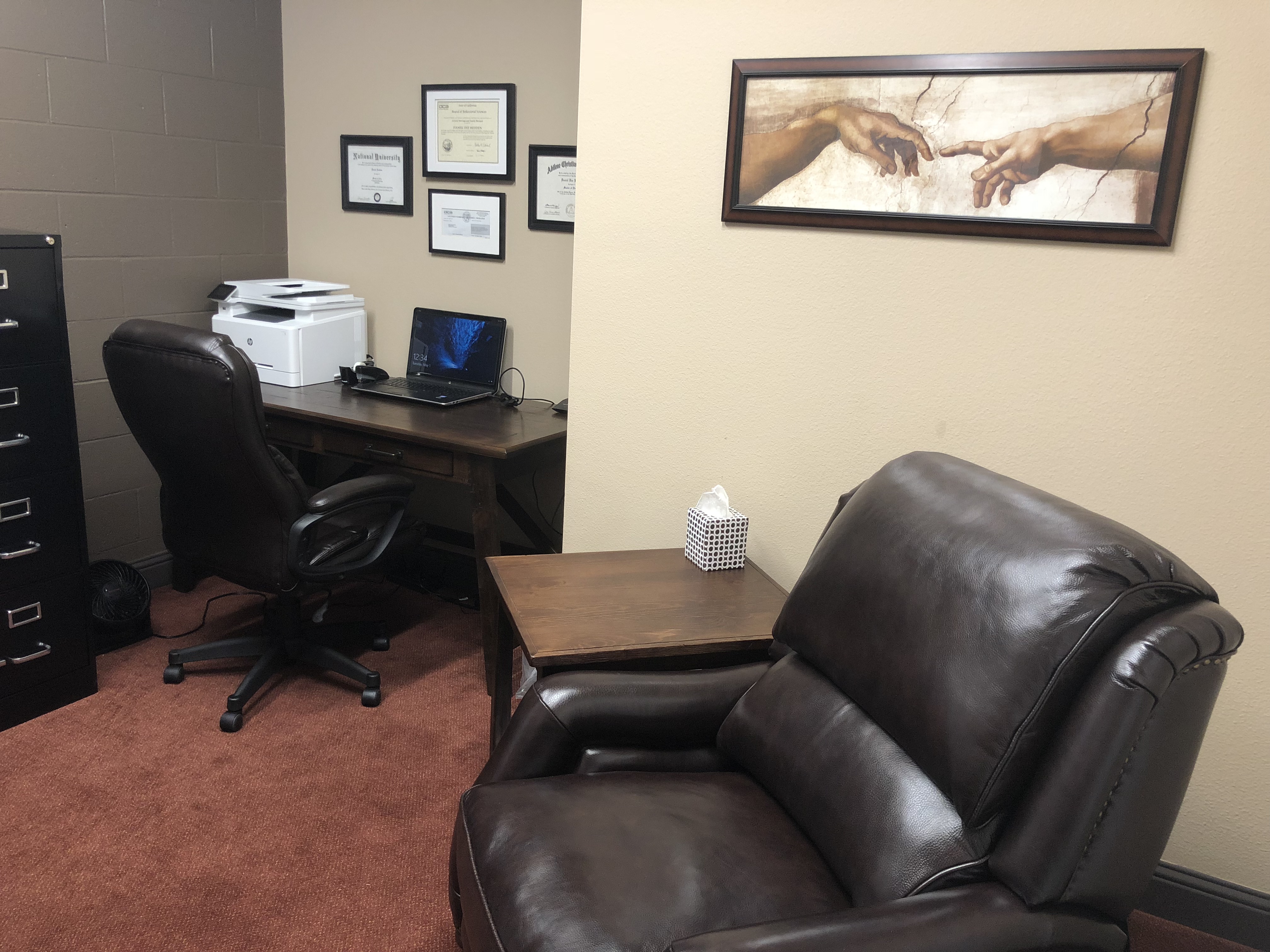 Therapy office with seating area